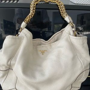 White leather Prada bag; looks used but no flaws and in very good condition